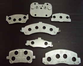 Disk pad plates for automobiles